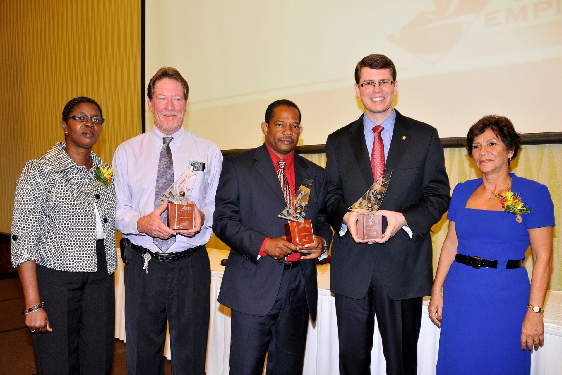 Ros Jackson and Vivian Ann Gittens posing with the winners of the BBE 2010 Awards