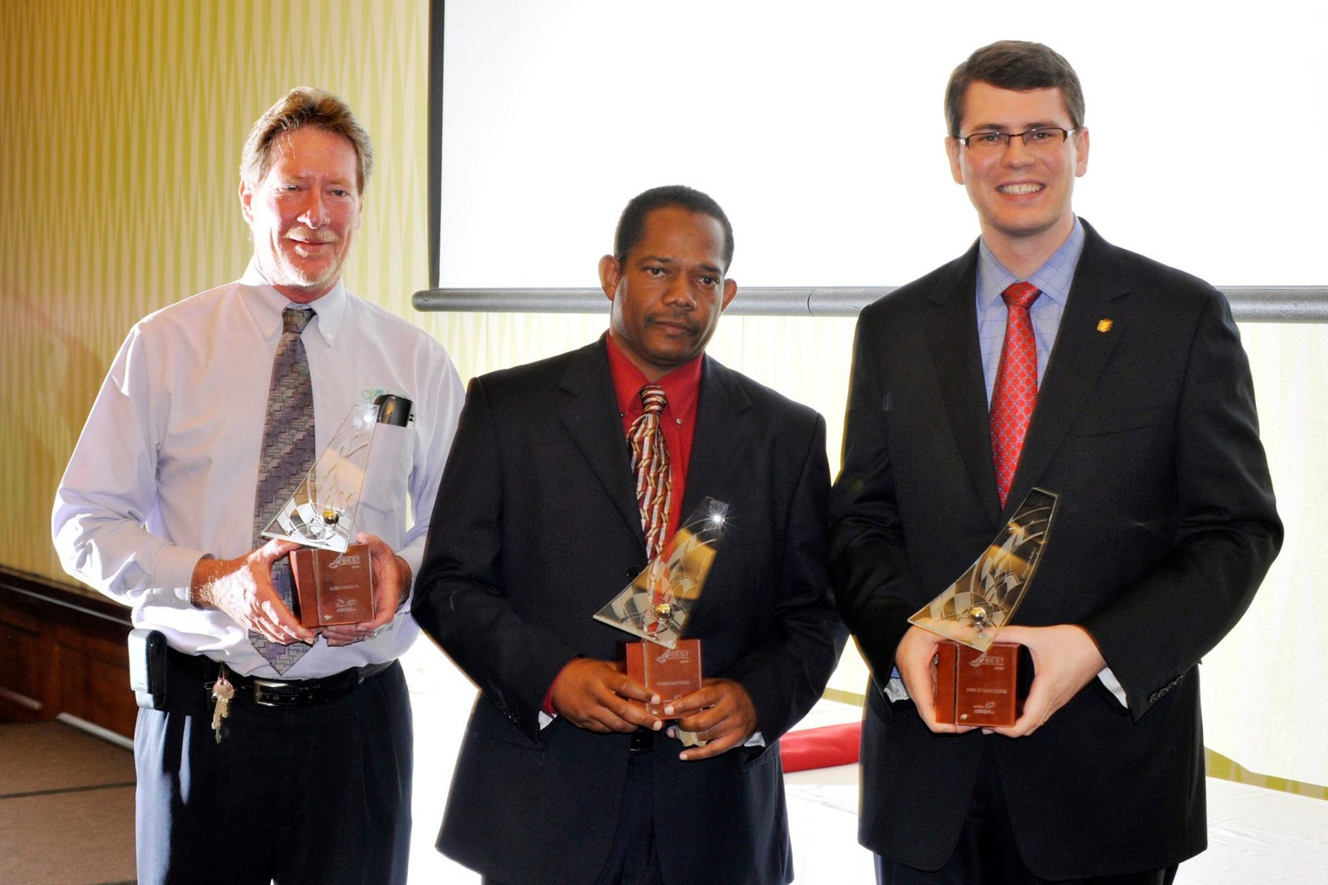 Winners of the Barbados' Best Employers 2010. Globe Finance Inc. (left), Federal Express (middle) and The Bank of Nova Scotia Caribbean East (right)