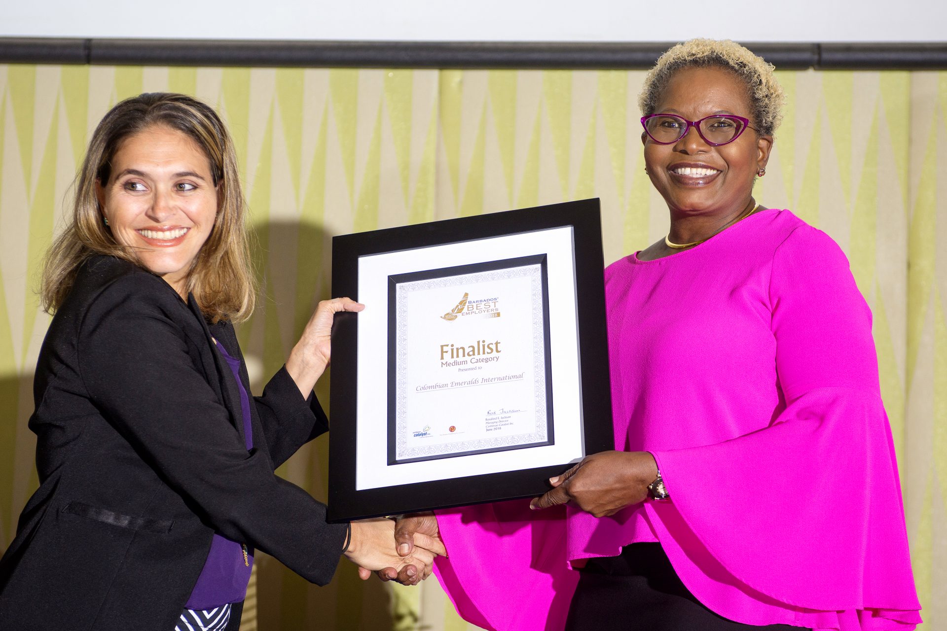 Jacqueline presenting Angela Reifer at Colombian Emeralds with a Certificate as one of the Finalist in the Medium category