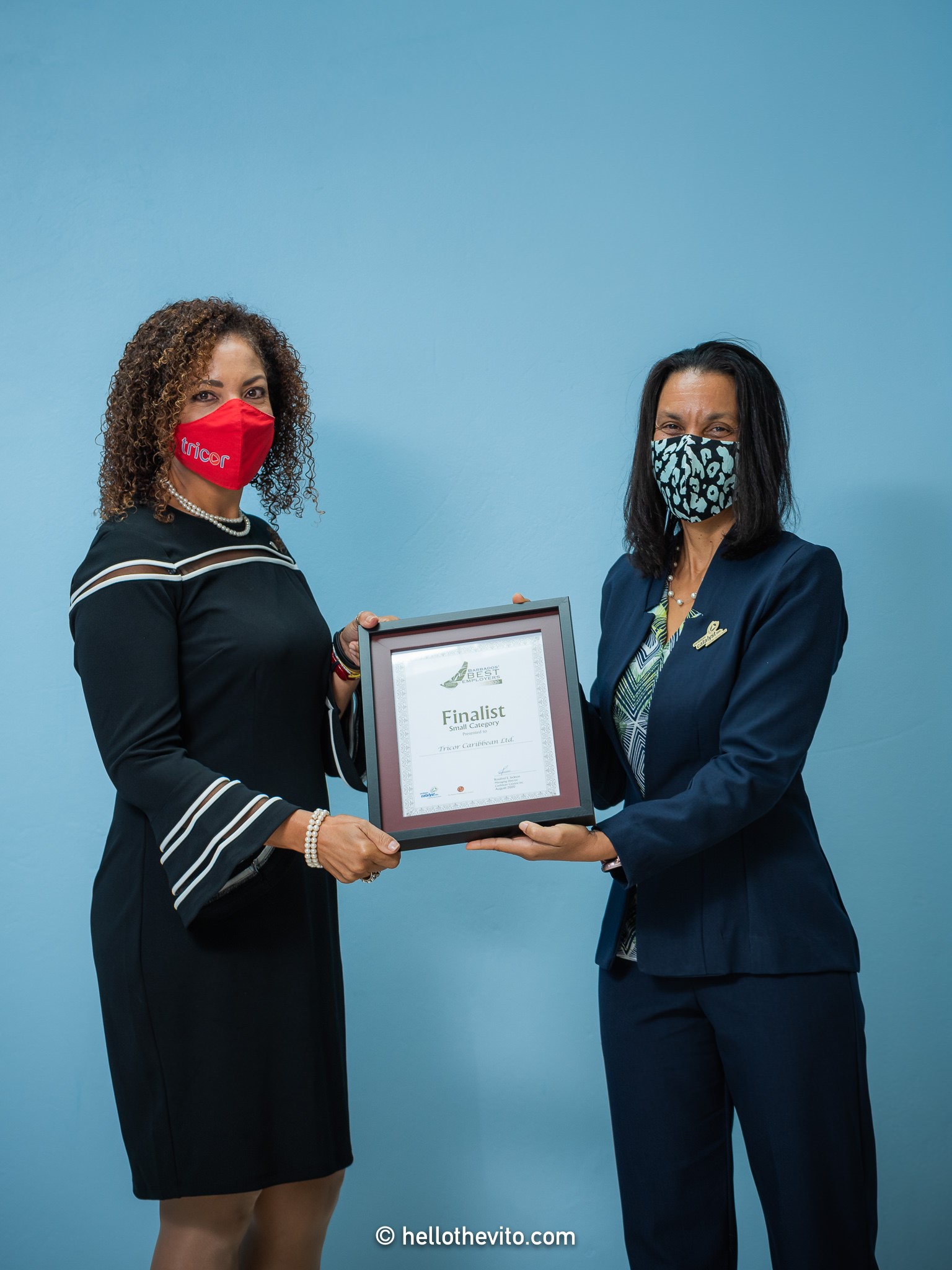 Laura Husbands presenting Connie Smith at Tricor with a Certifcate as one of the Finalist in the Small Category
