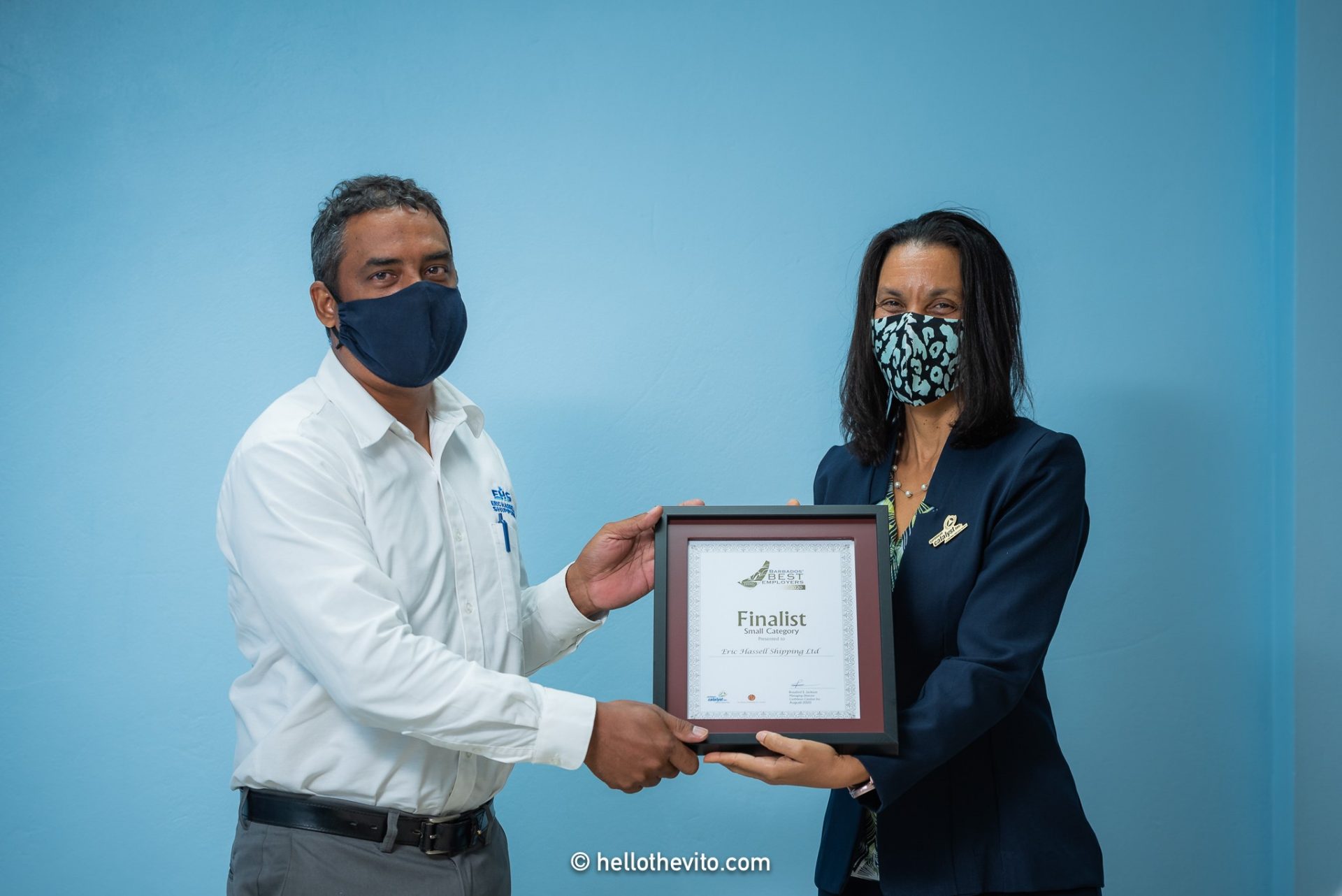 Laura Husbands presenting Eric Hassell Shipping with a Certifcate as one of the Finalist in the Small Category