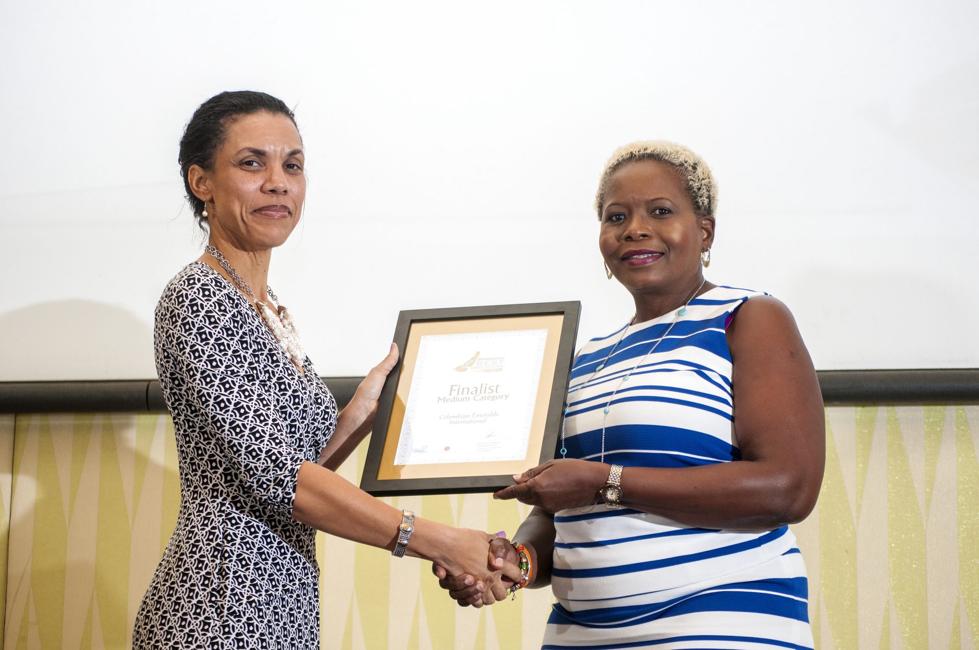Laura Husbands presenting the Certificate of Recognition