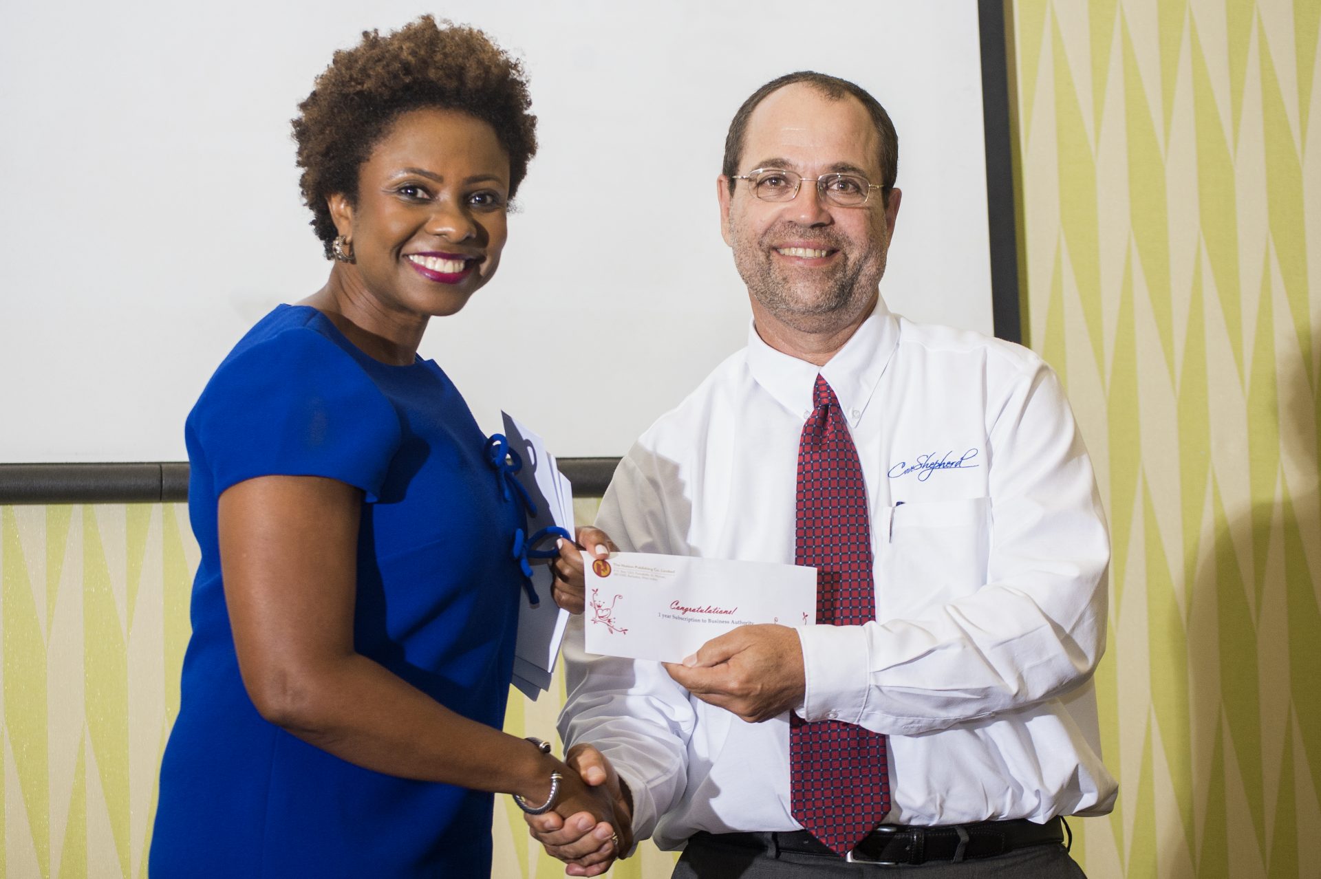 Paulette Jones at Nation presenting one year subscription to Business Authority