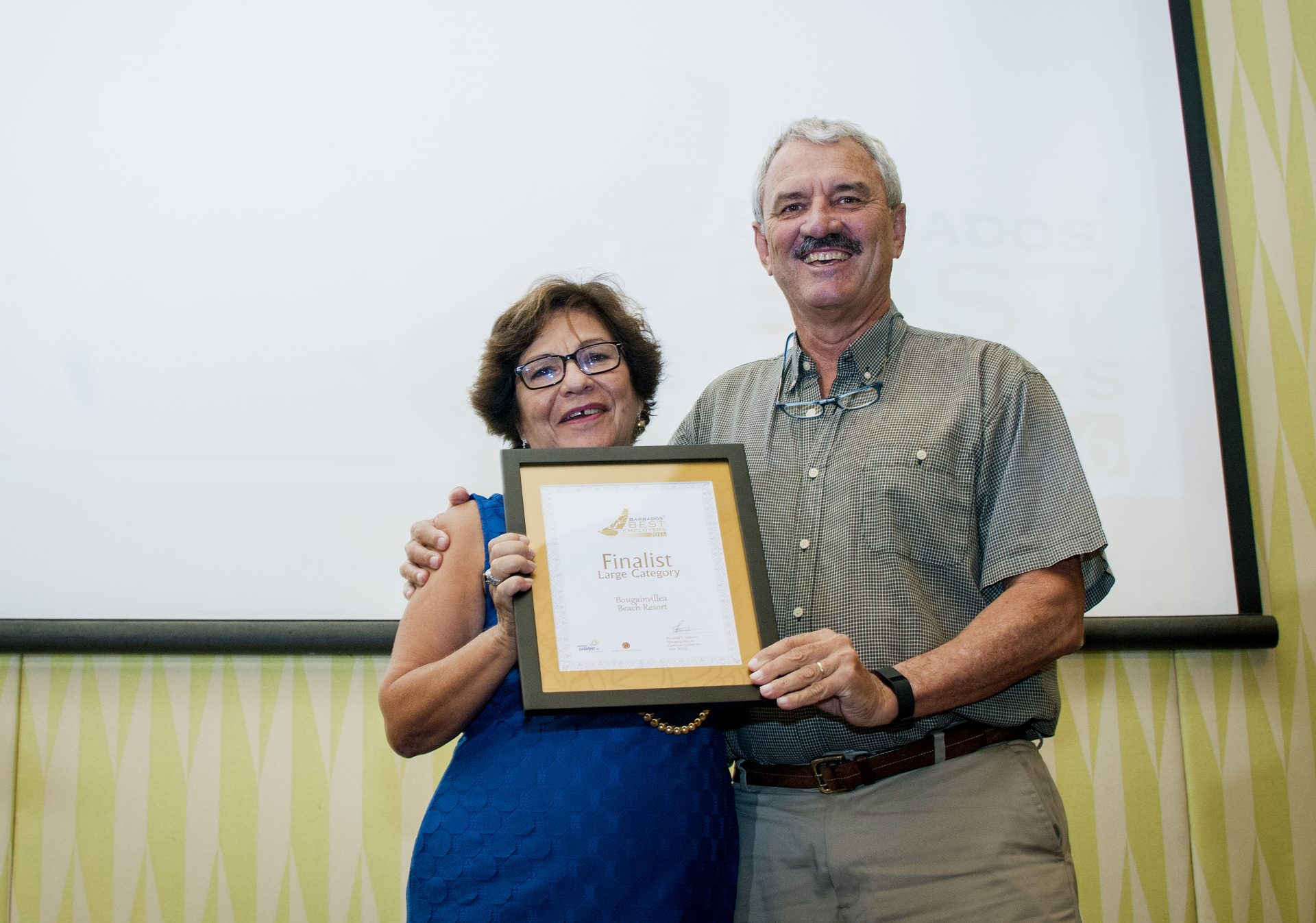 Ros Jackson, Managing Director presenting the Certificate of Recognition a
